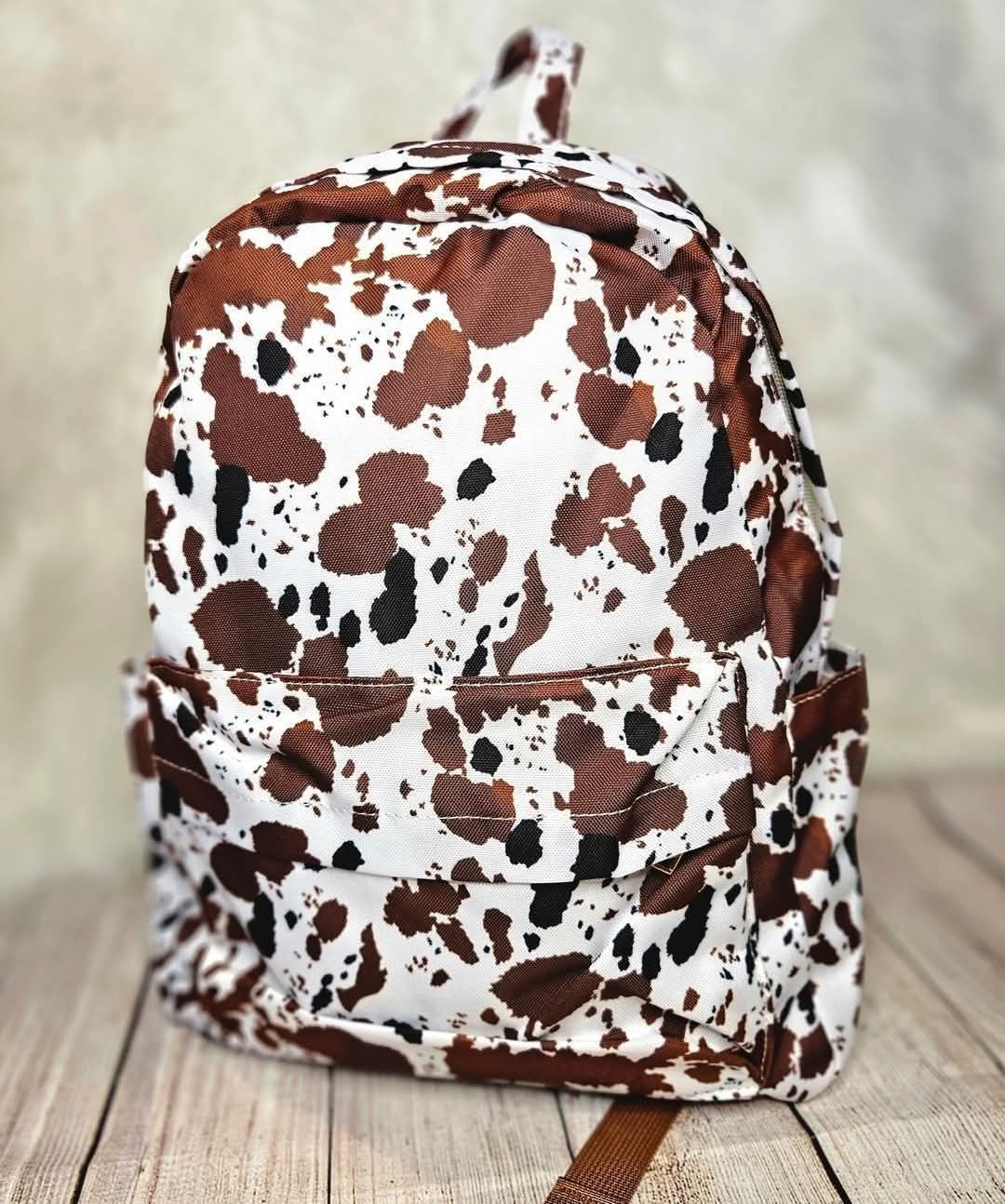Brown Cow Print Backpack